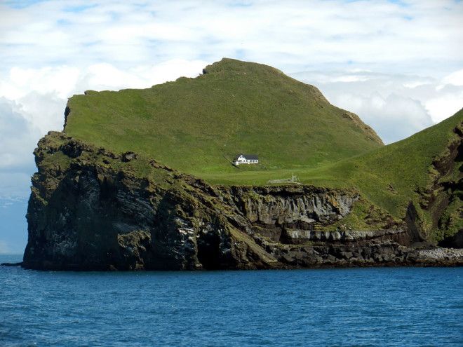 The Solitairy House Of Elliaey Island Iceland